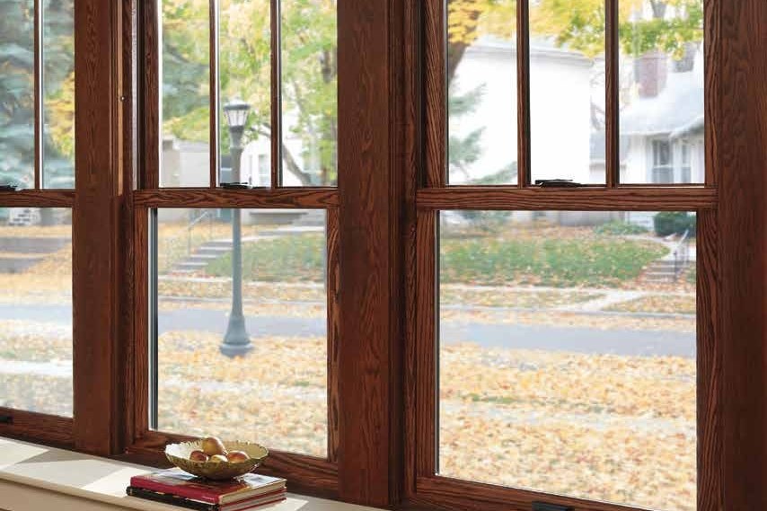Andersen 400 Series wood double-hungs with grilles — product photography courtesy of Andersen