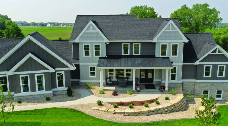 LP SmartSide engineered wood siding on a farmhouse — product photography courtesy of LP Building Solutions
