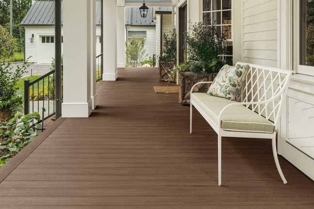 TimberTech composite decking on a covered porch — product photography courtesy of TimberTech