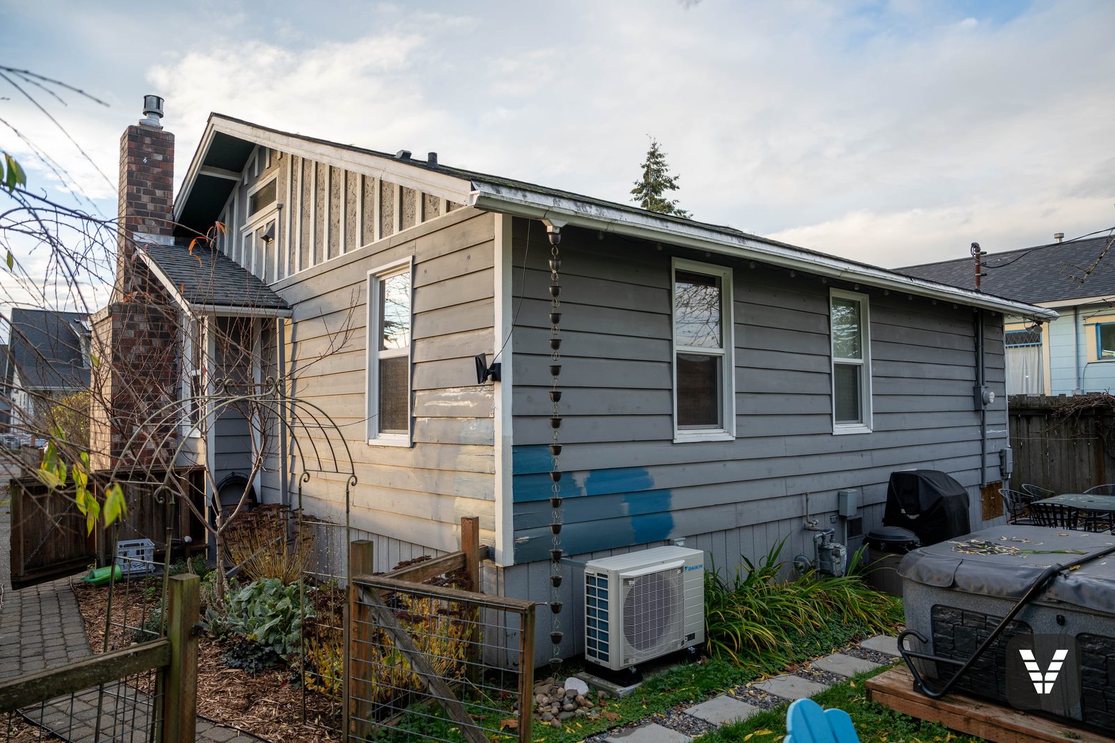 Rear corner before — asbestos-cement siding — before, Bellingham, WA