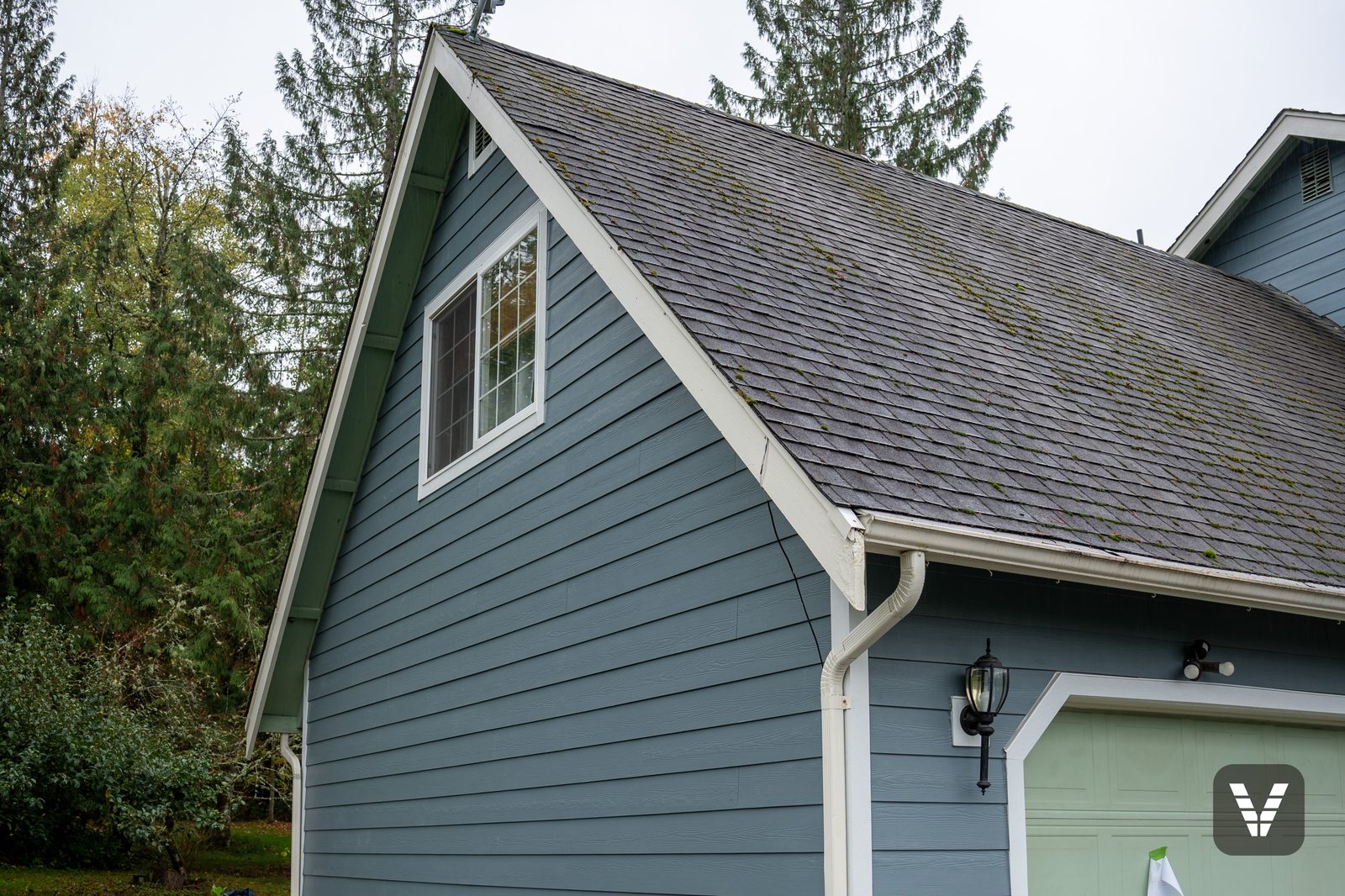 The garage gable corner in fresh Boothbay Blue with white trim
