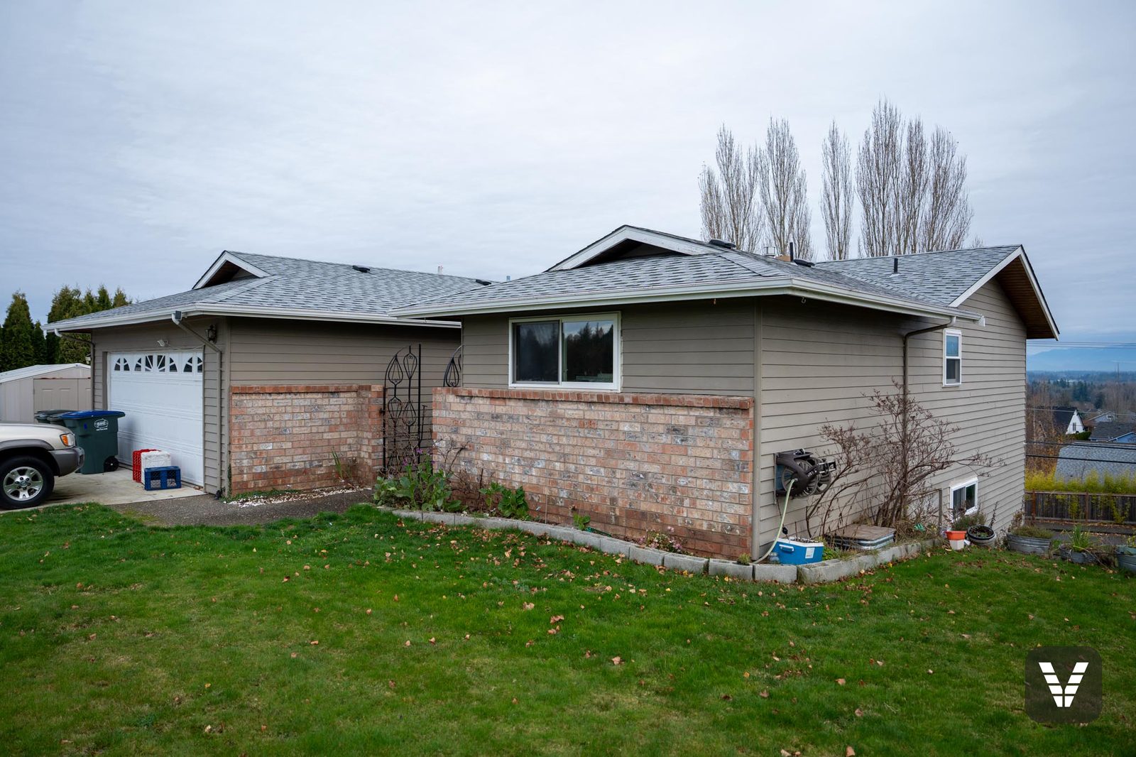 Before — front and garage with tired tan lap siding — before, Ferndale, WA
