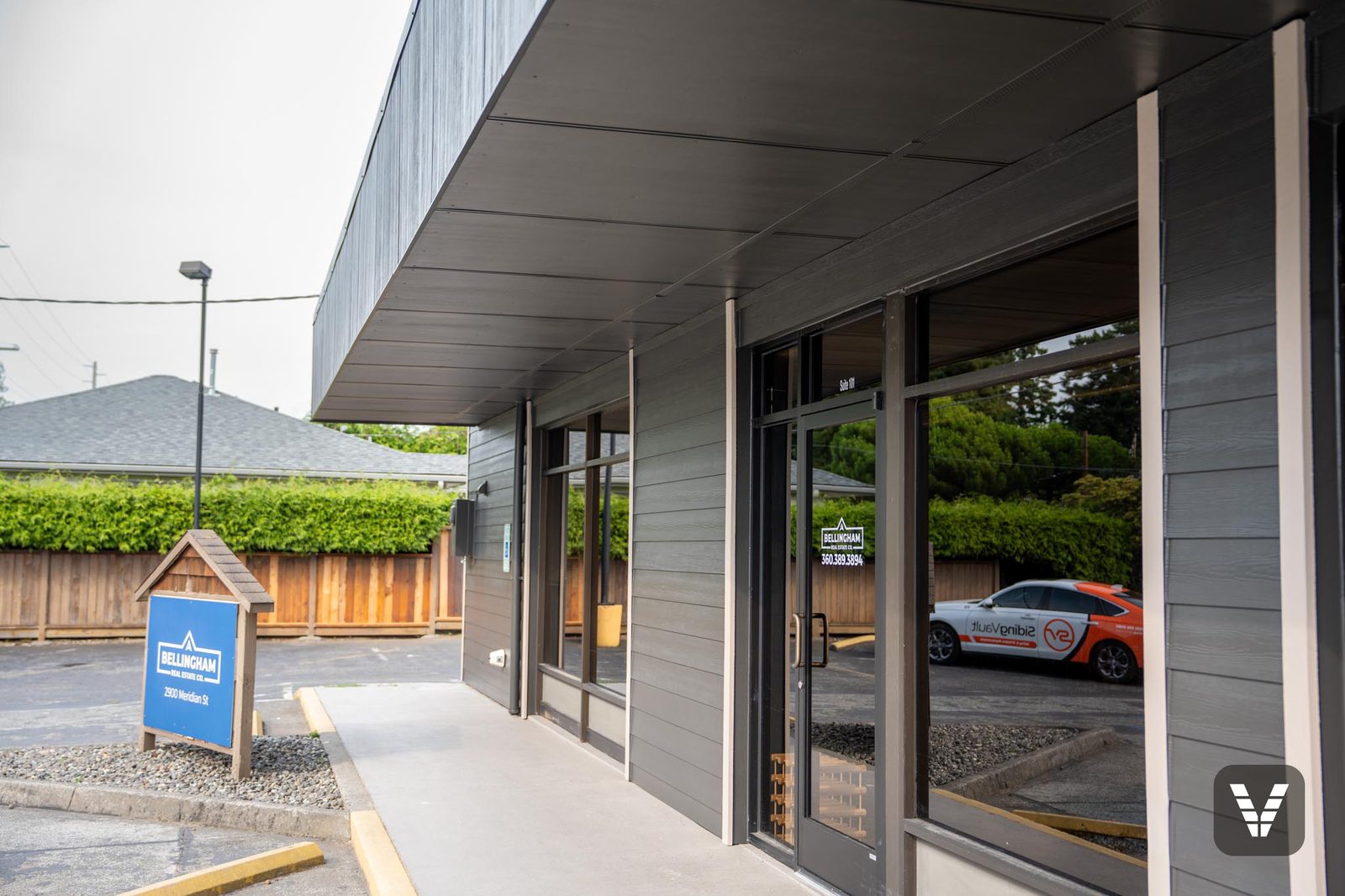 Covered entry walkway with the redesigned overhang and new HardiePlank lap siding
