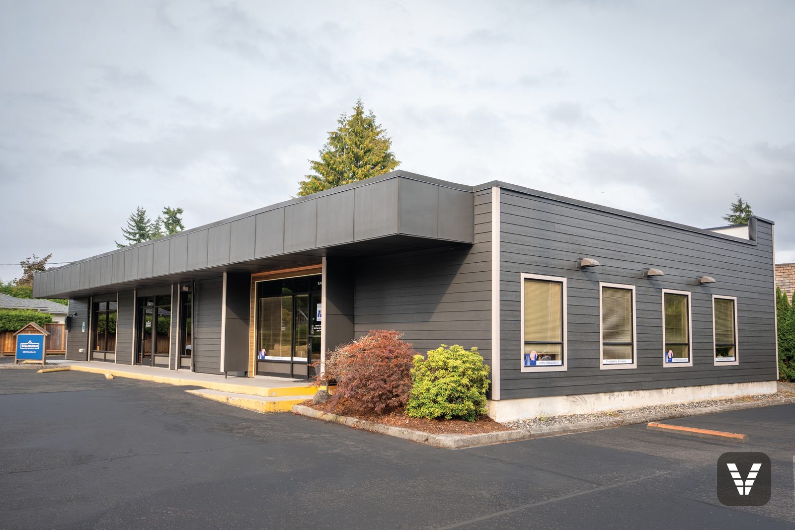 The finished front and entry overhang — same project, walked through and handed over, Bellingham, WA