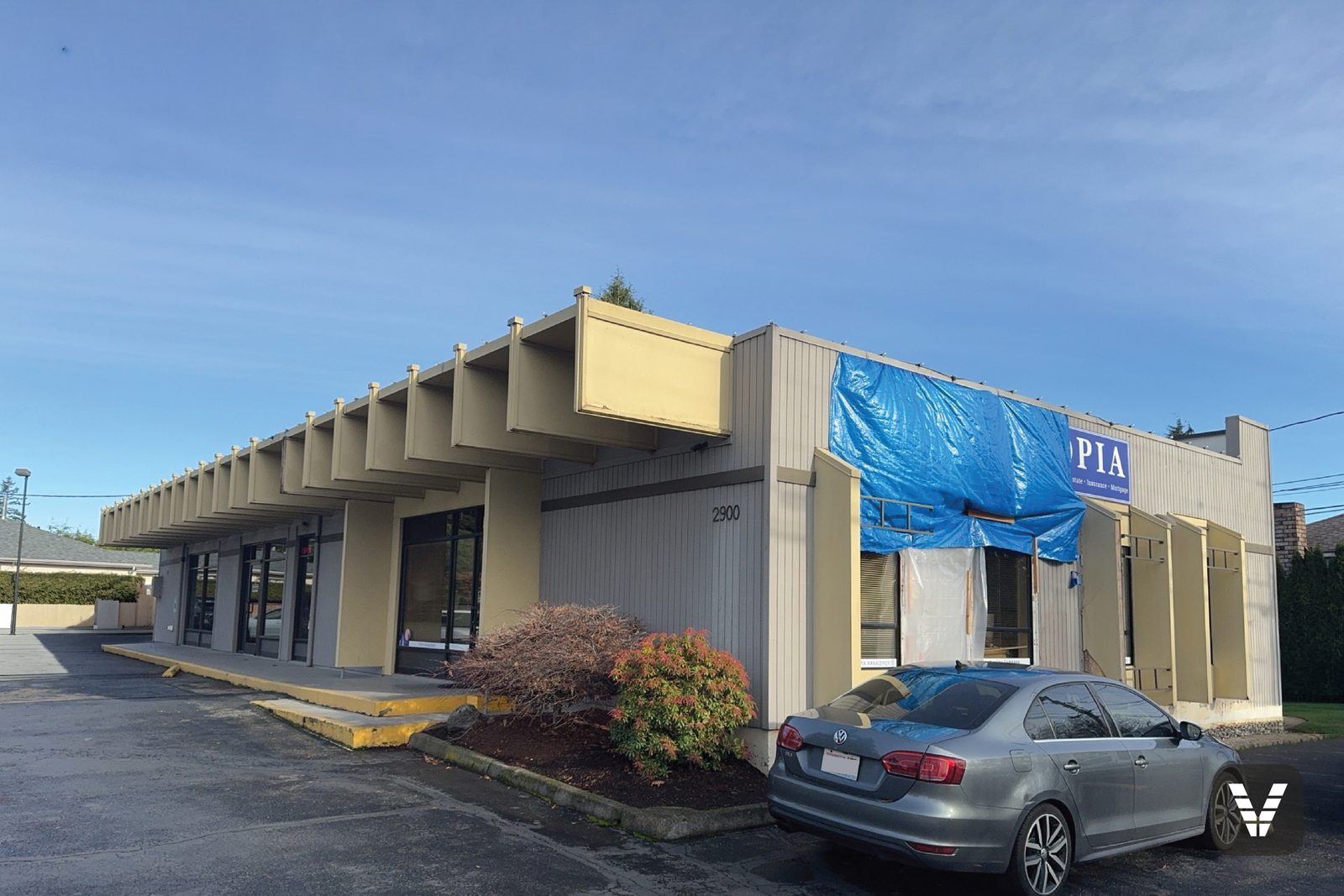 Where this project started — the building as we walked it for the bid, Bellingham, WA