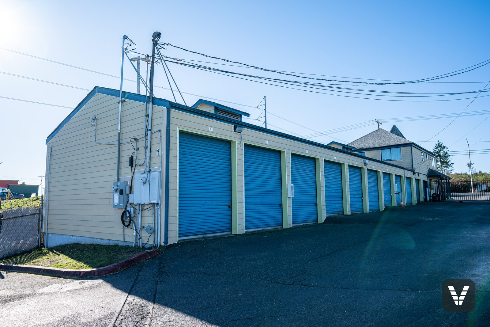 The long storage row — primed lap running the full length above the unit doors