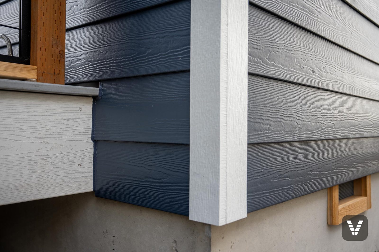 Corner detail — HardieTrim corner and band board over the foundation