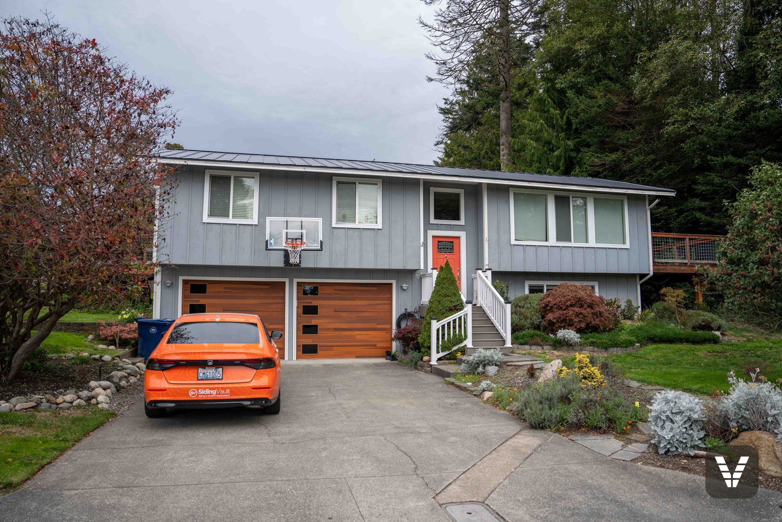 Street side before the remodel — original painted wood panel siding — before, Anacortes, WA