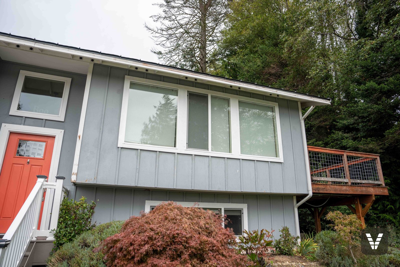The front before the remodel — the original windows we measured for the per-opening bid, Anacortes, WA
