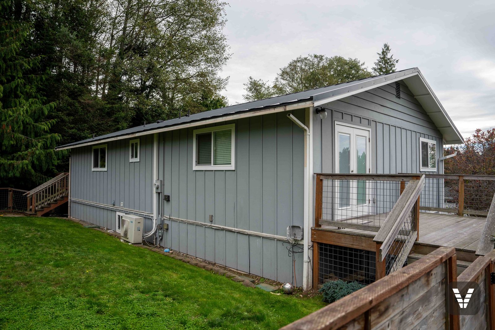 The old patio doors and deck before removal — every opening inspected as it came open, Anacortes, WA