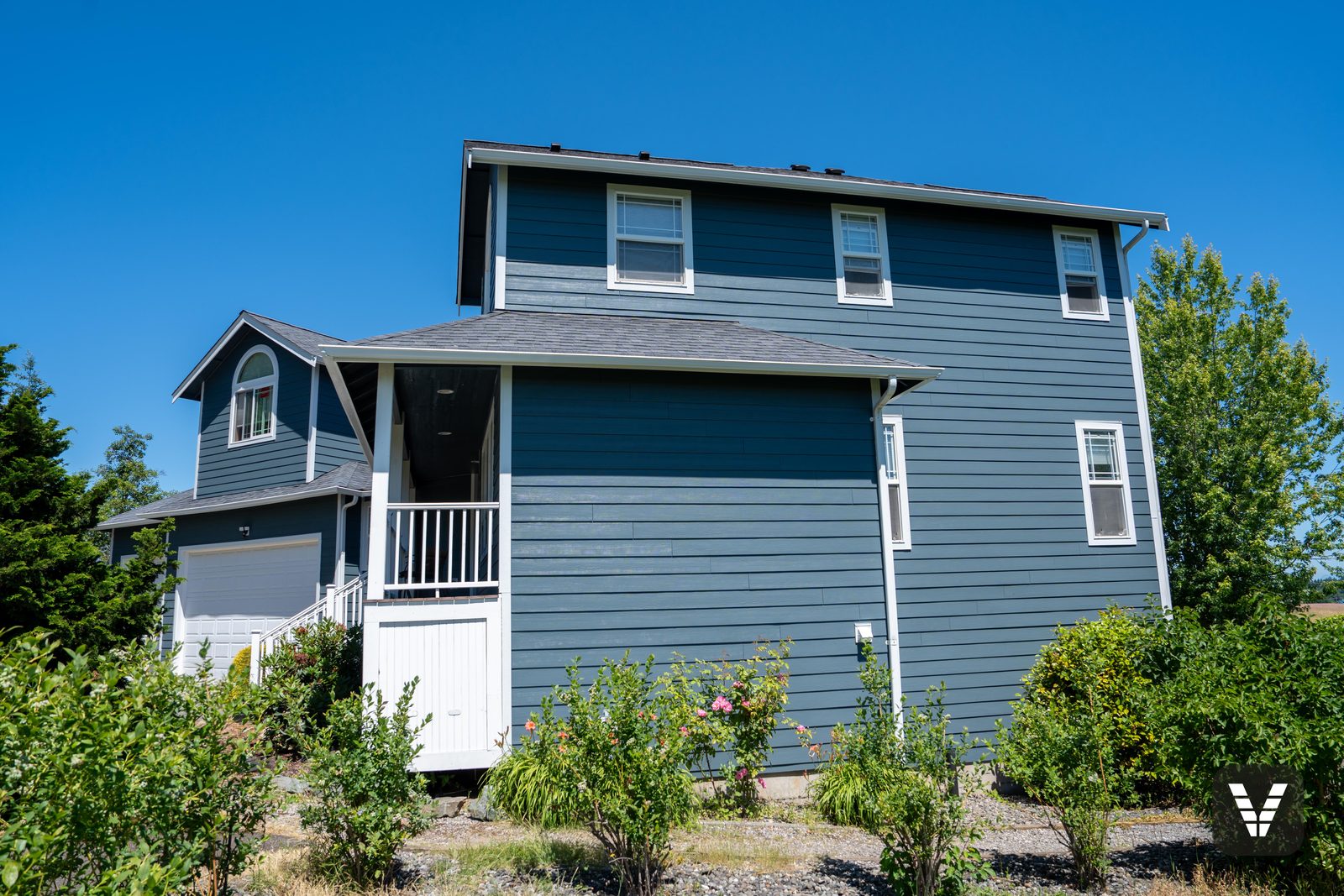 The side elevation with the skirted porch base