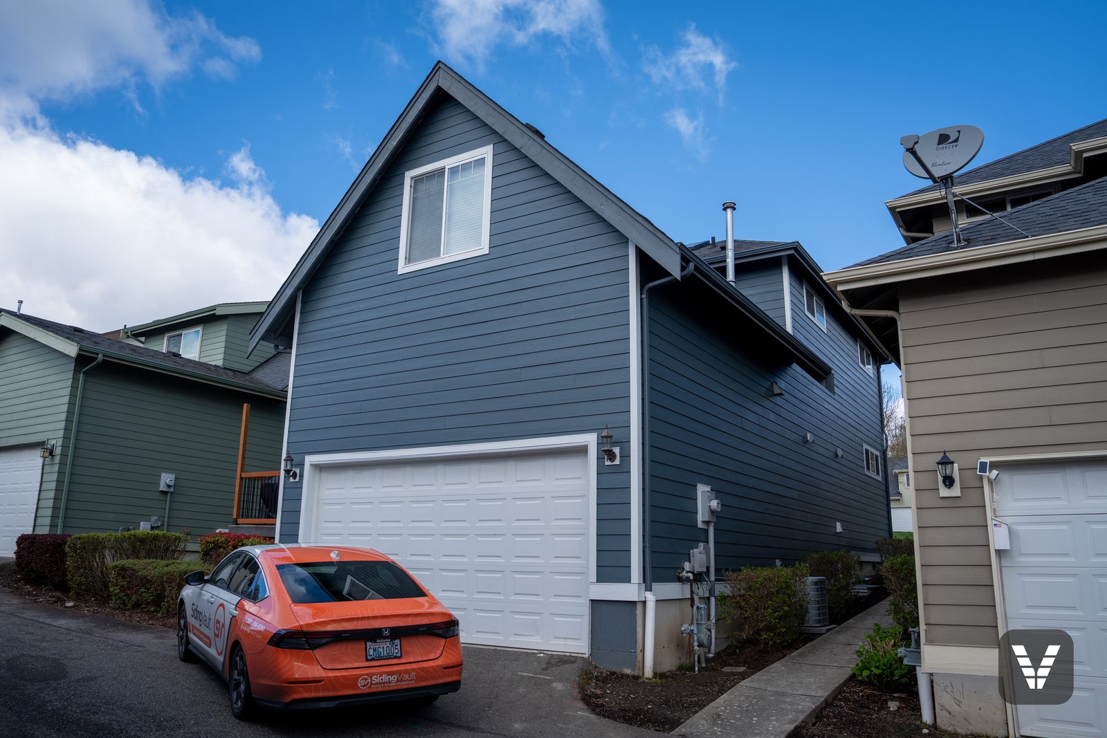 Rear garage elevation in Evening Blue with fresh white trim