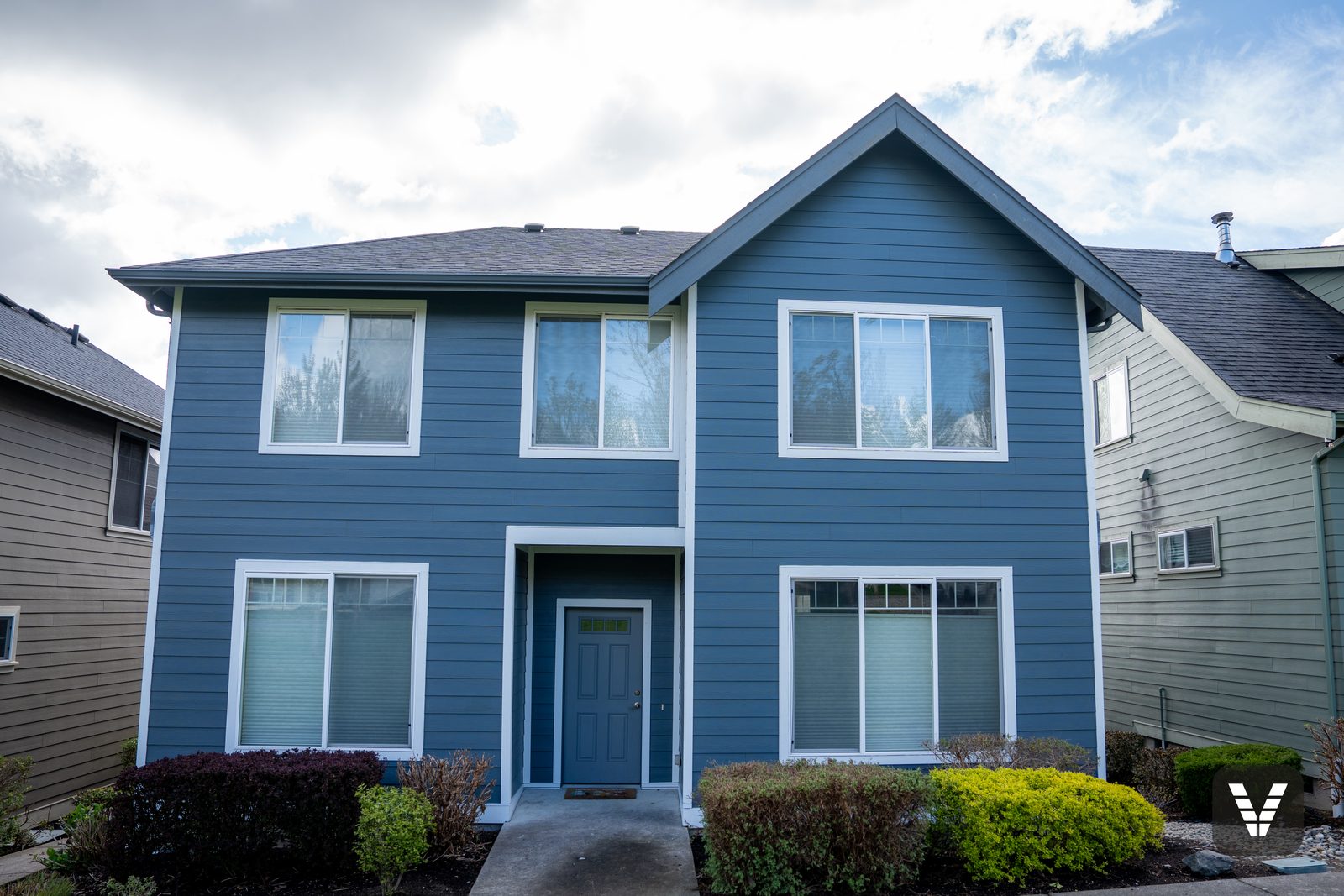 Front elevation up close — 7-inch reveal Cedarmill lap spanning both stories