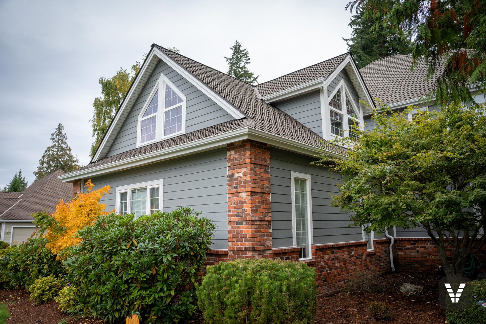 The finished view — front gable corner — after, SWV project in Anacortes, WA