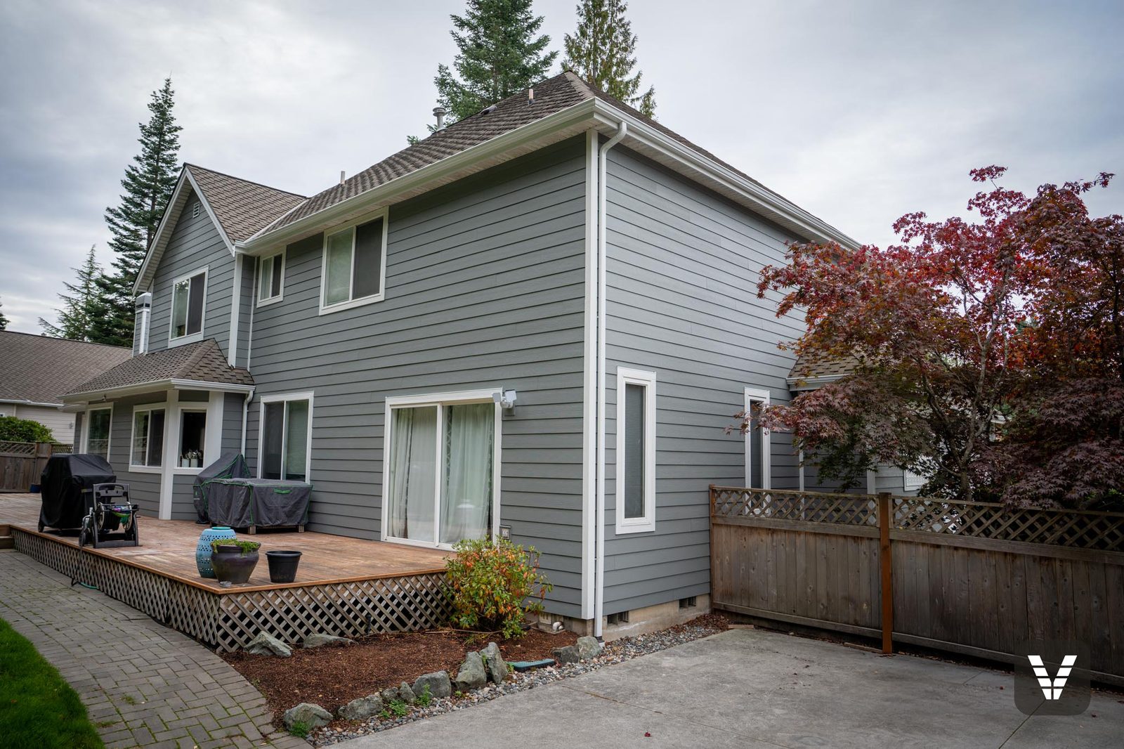 Rear corner over the deck in Gray Slate with Arctic White trim — Siding & Window Vault project in Anacortes, WA
