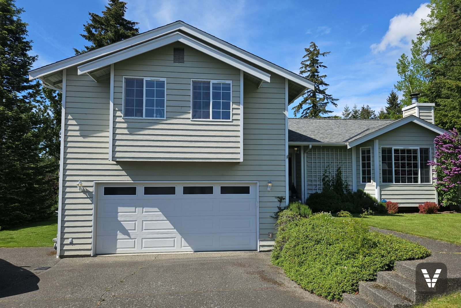 Front elevation before the project — faded sage siding — before, Bellingham, WA