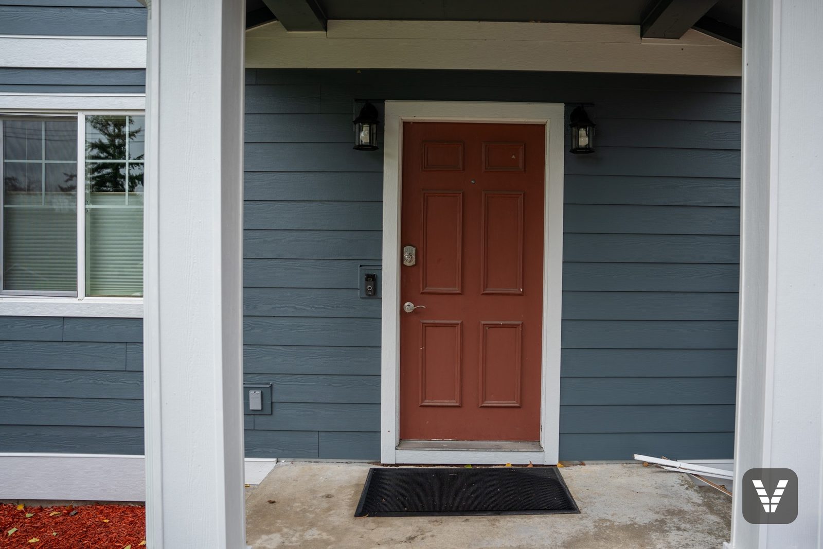 Mid-project at a Ferndale entry — the old door still on duty, its Codel replacement waiting on the porch