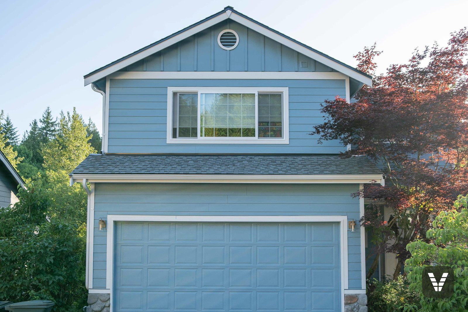 New grid windows set in Arctic White trim on a Bellingham re-side