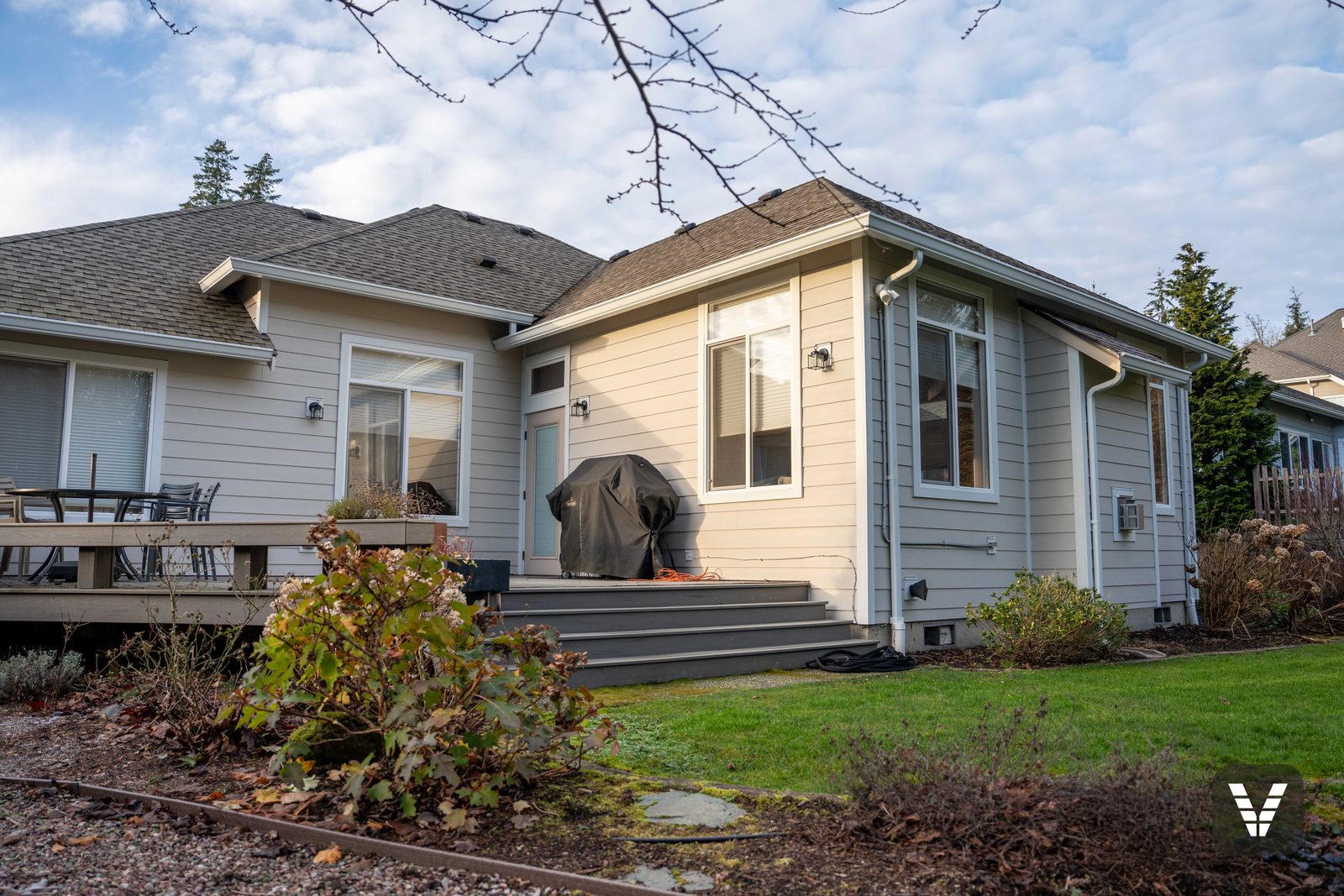 The rear corner — new lap, wrapped corners, and the back entry — Siding & Window Vault project in Bellingham, WA