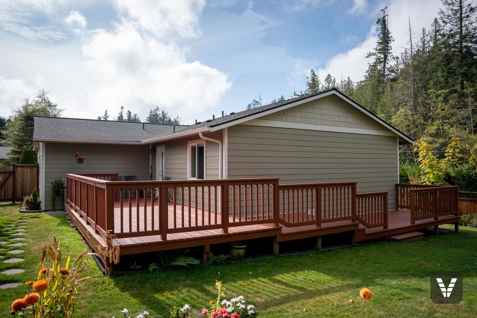 The back deck and re-sided walls in evening light