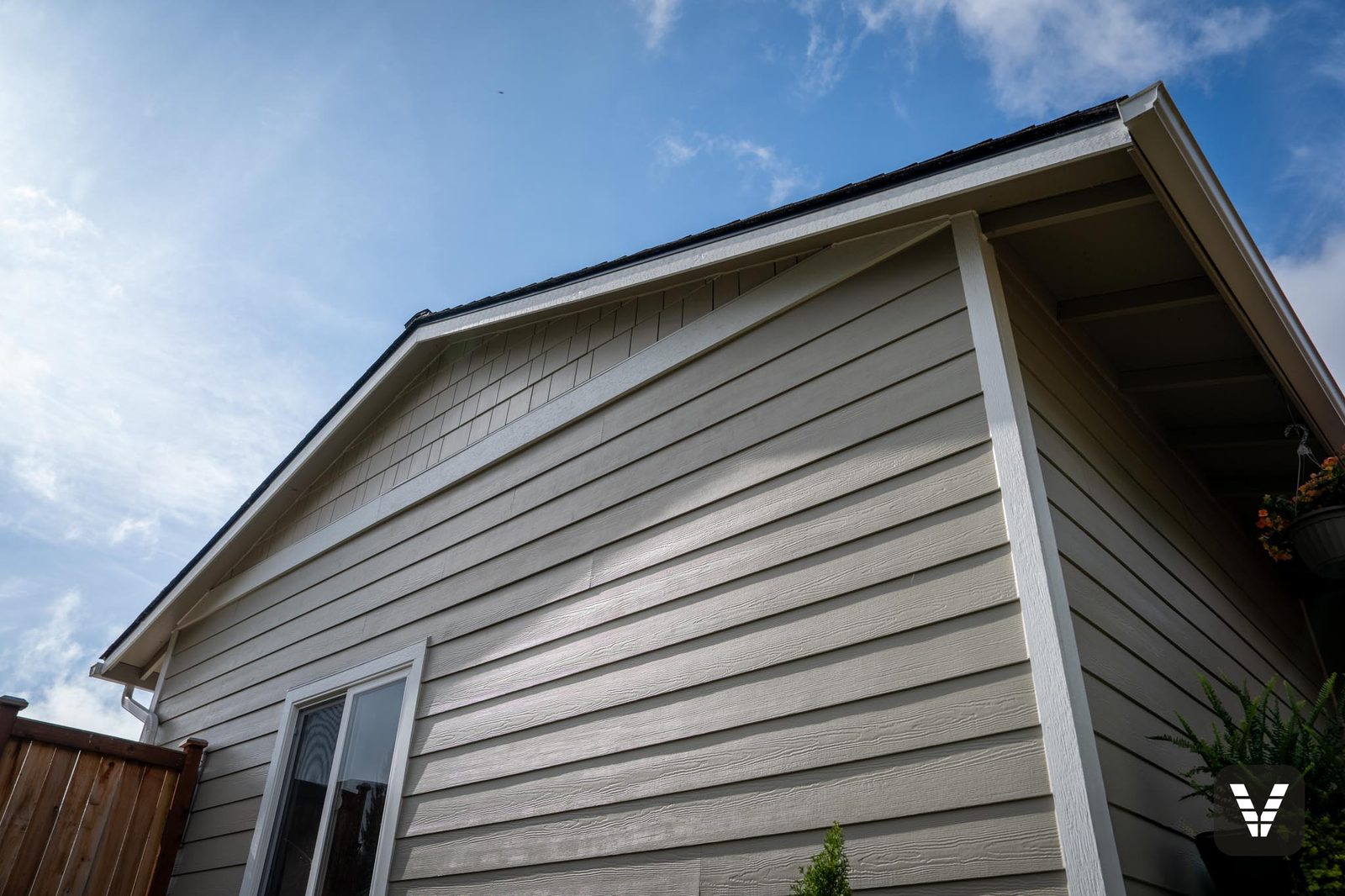 Looking up the gable — shingle texture and crisp trim lines — Siding & Window Vault project in Anacortes, WA