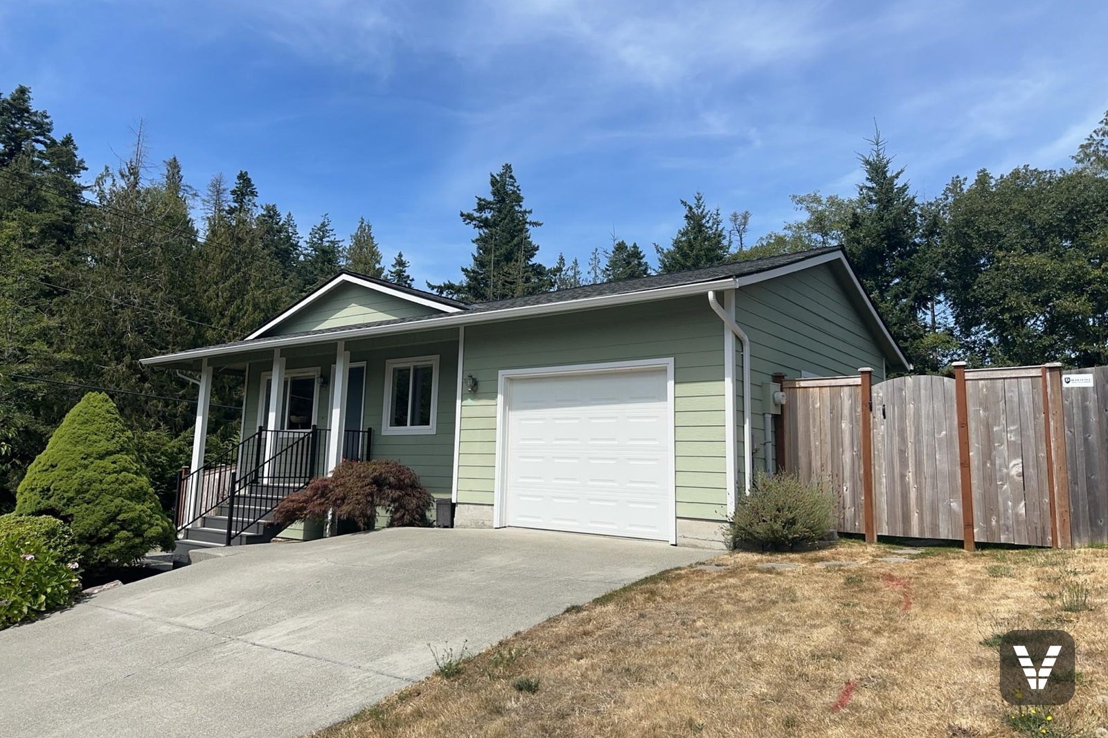 Front & garage before the re-side — aging sage green siding — before, Anacortes, WA